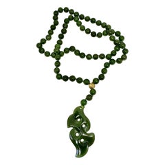Art Deco Spinach Jade Necklace 26 Inches 10 Karat Yellow Gold 8mm Jade Beads