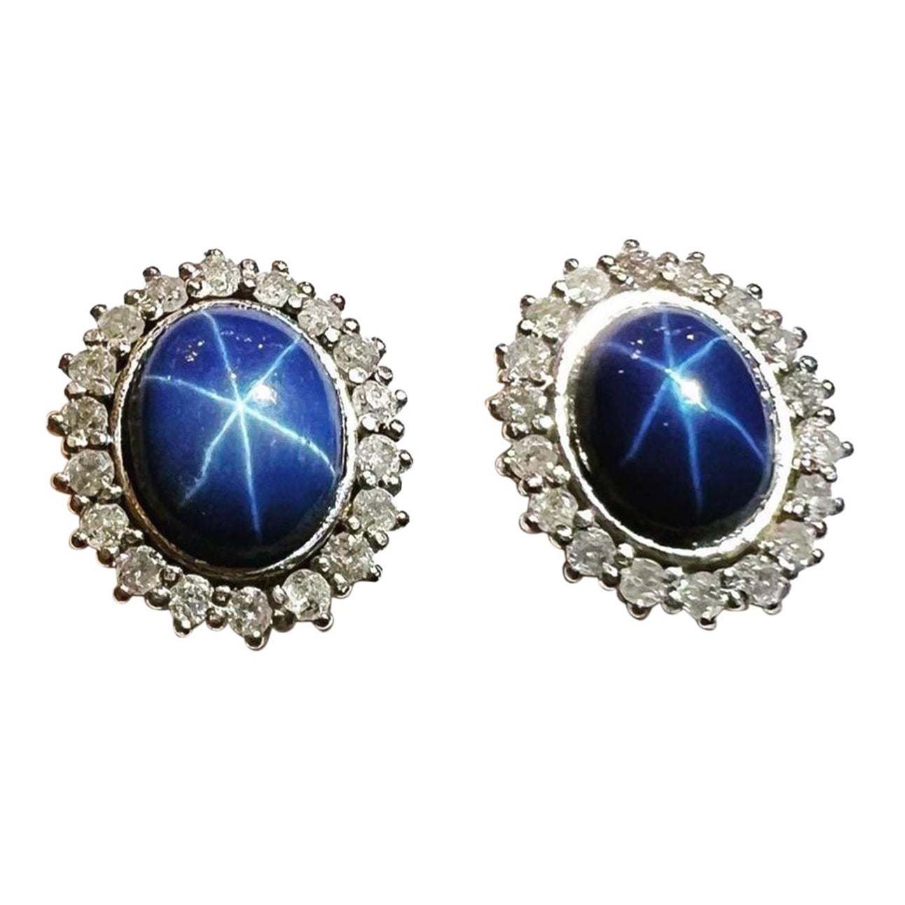 1960s, Sapphire Star Cabochon and Diamonds Halo 18k white Gold Cluster Earrings For Sale