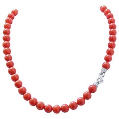 Coral, Diamonds, 18 Karat White Gold Necklace.