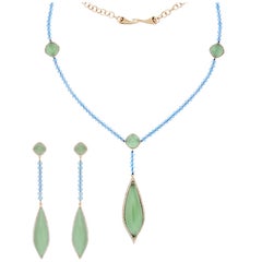 Boucles d'oreilles en or jaune 14 carats, topaze bleue suisse et diamants