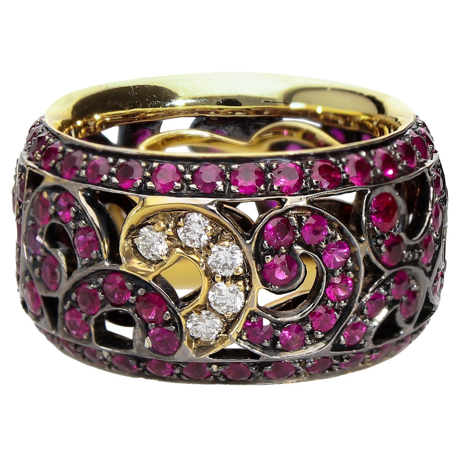 Eternity Band Ring with 4.13 ct of Rubies and 0.25 ct of Diamonds. Made in Italy