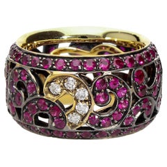 Eternity Band Ring with 4.13 ct of Rubies and 0.25 ct of Diamonds. Made in Italy