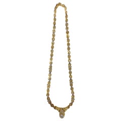 Elegant Gold Chain with Brilliant Diamond Centerpiece and smaller diamonds