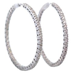 Orecchini a cerchio con diamante rotondo da 1,08 carati in oro bianco