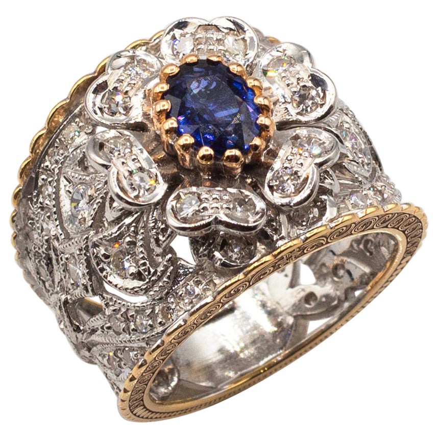 Anello in oro giallo con diamante blu e zaffiro, in stile Art Deco, bianco e moderno, taglio rotondo