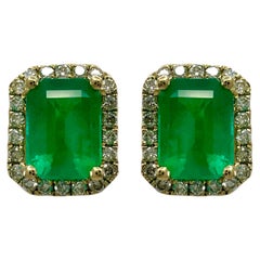 Esmeralda rusa y diamante de 3,57 ct con certificado GIA Pendientes con halo de oro de 18k