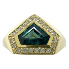 1,46 quilates Zafiro de fantasía sin tratar Diamante de cambio de color Anillo con halo de oro de 18 quilates