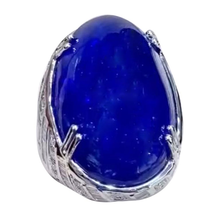 Anillo de oro de 18 quilates con tanzanita certificada AIG de 50,00 quilates y diamantes de 2,50 quilates