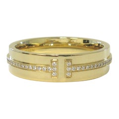 TIFFANY & Co. Anello a T con diamante largo 5,5 mm in oro 18 carati 9
