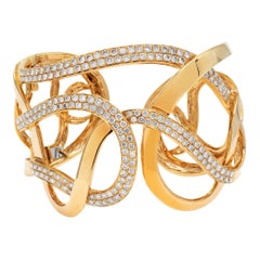 Yellow gold and Diamond cuff bangle