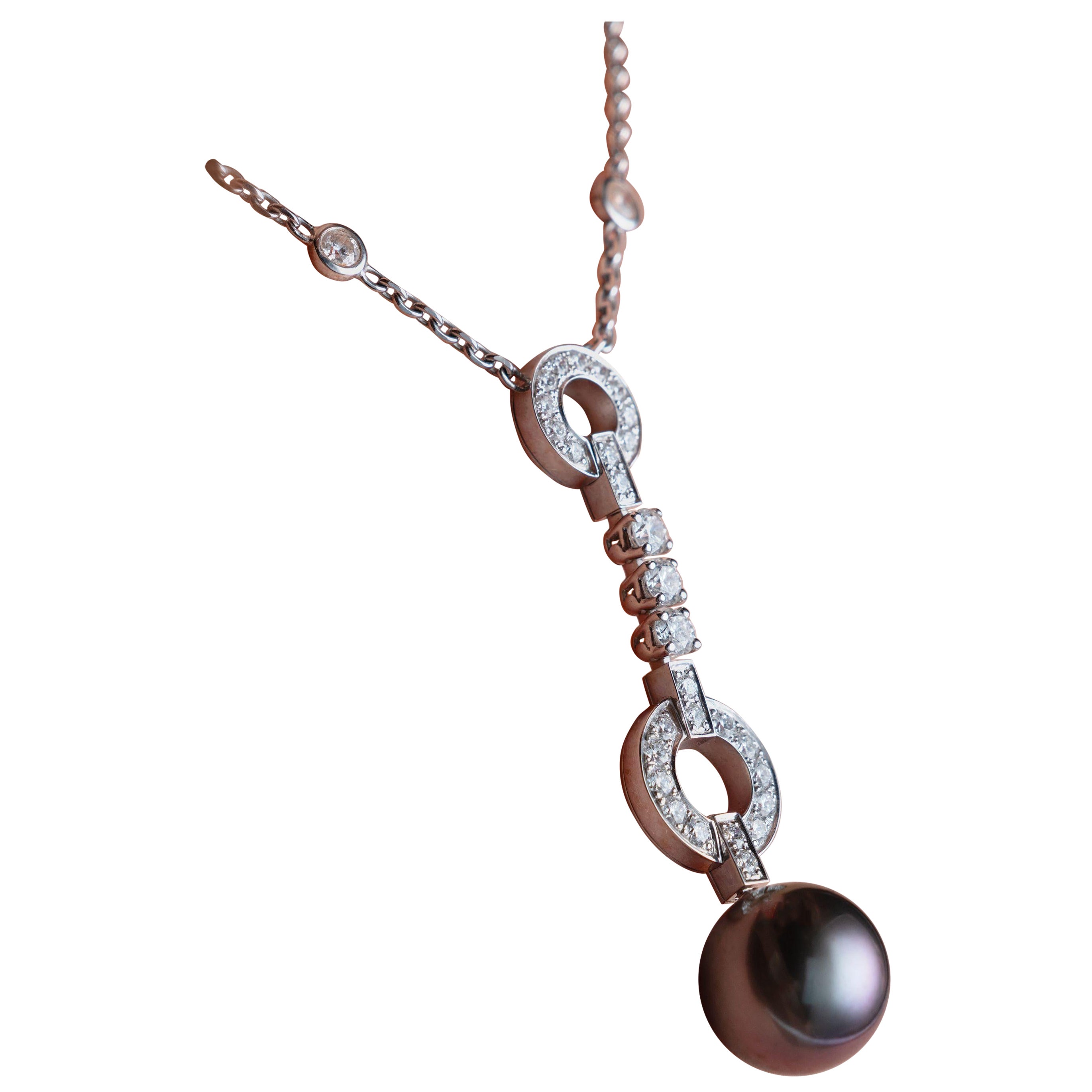 A Black Pearl And Diamond Necklace, by Cartier For Sale