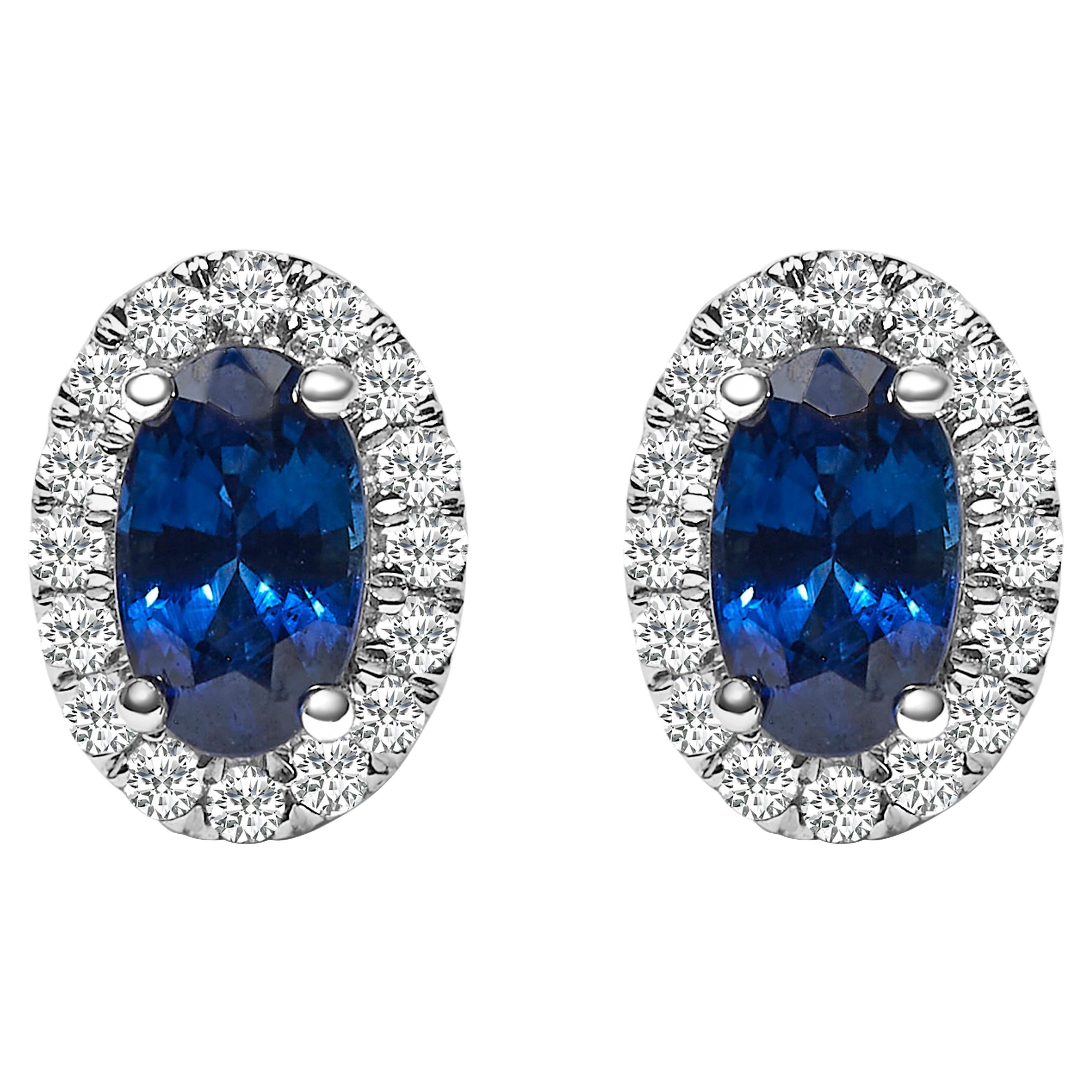 10K White Gold 5x3 MM Oval Blue Sapphire and Diamond Halo Stud Earrings