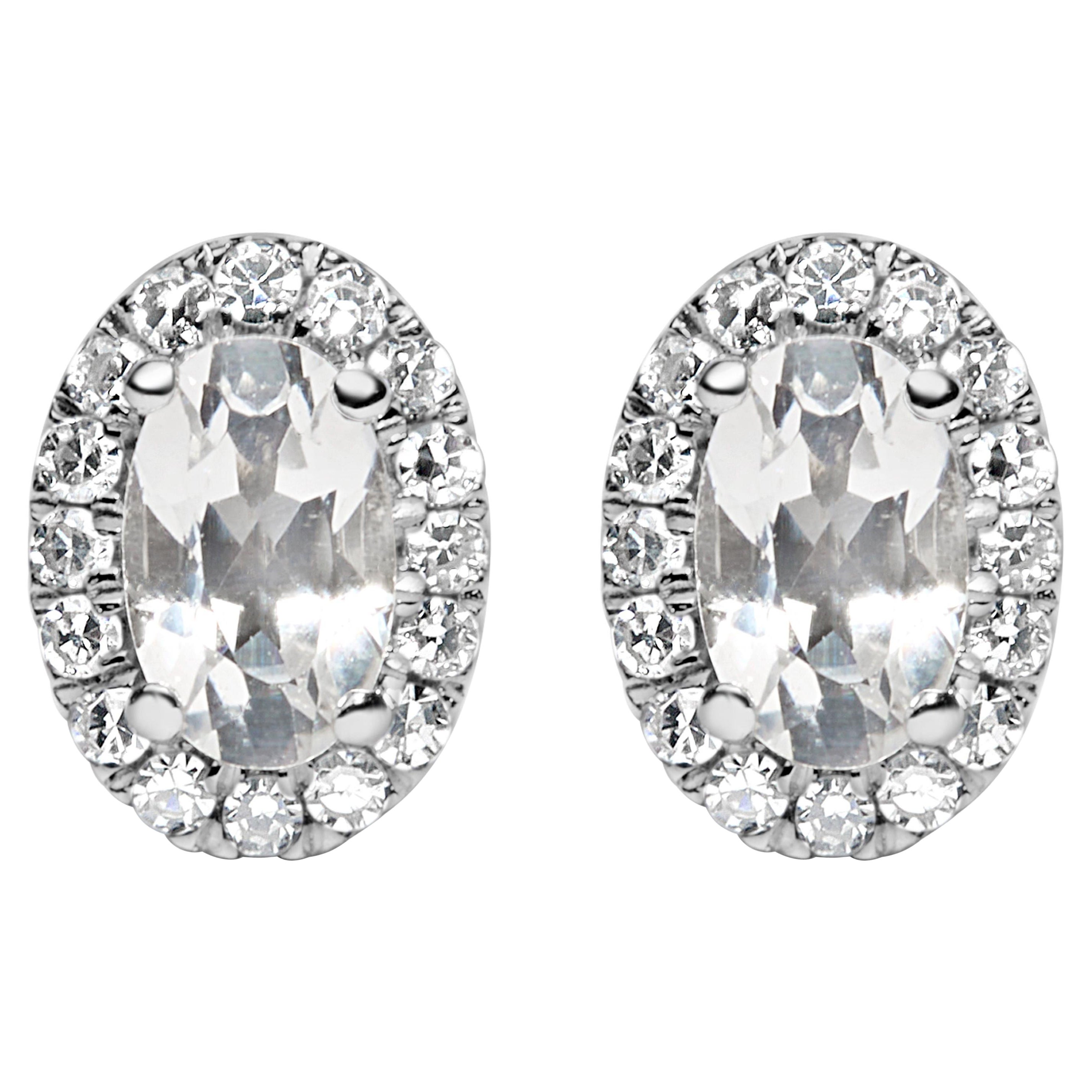 10K White Gold 5x3 MM Oval White Topaz and Diamond Halo Stud Earrings