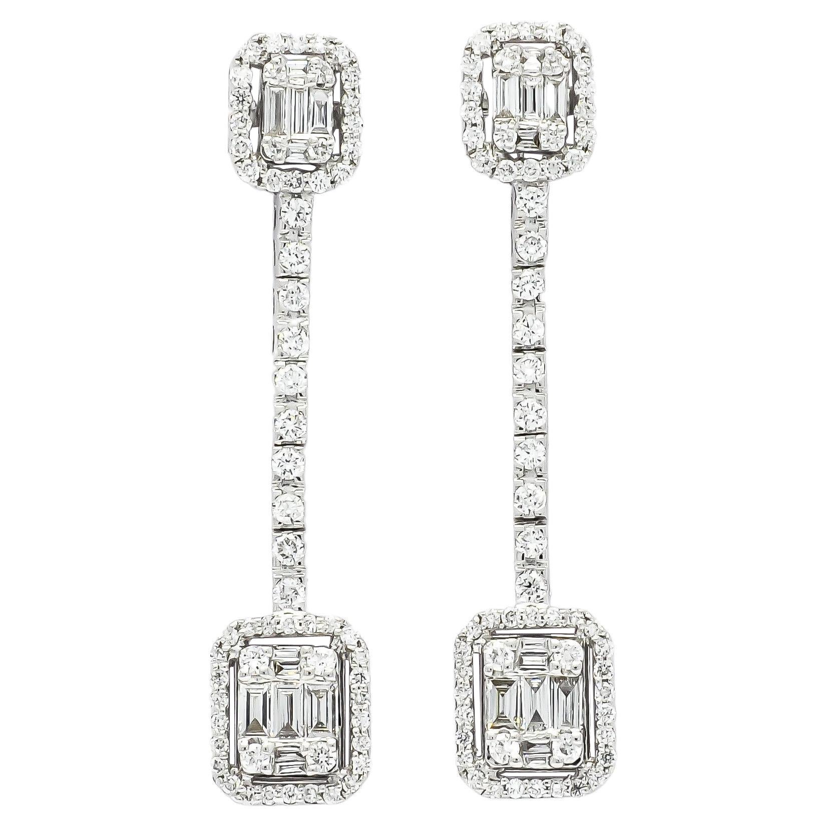 Introducing our 18KT Yellow Gold Baguette Illusion Halo Natural Diamonds Dangler Drop Earrings, a stunning and unique piece that will take your breath away. These earrings feature a combination of natural  baguette and round brilliant set in a  with