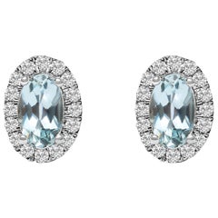 10K Weißgold 5x3 MM Ovalblauer Aquamarin und Diamant Halo-Ohrstecker