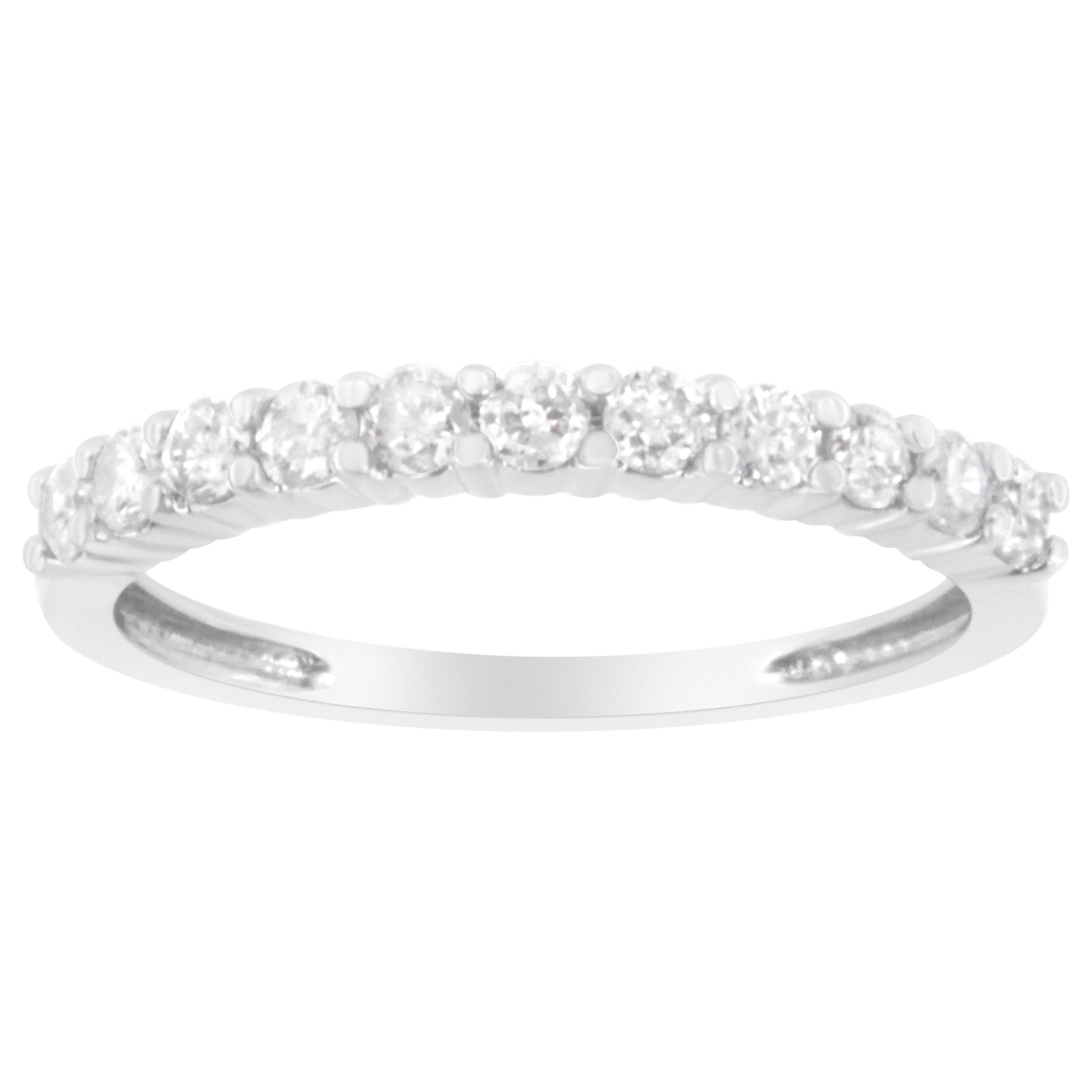 For Sale:  IGI Certified 1/2 Cttw Diamond 10K White Gold Prong Set Fluted Band Style Ring