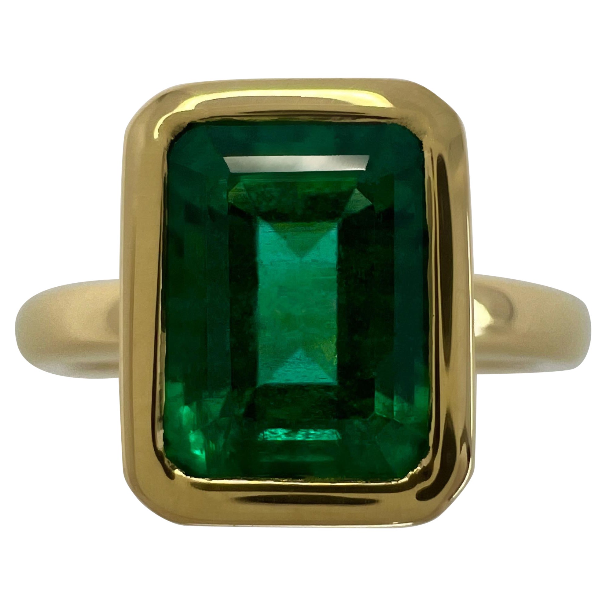 2.51ct Deep Green Emerald Octagon 18k Yellow Gold Rubover Bezel Solitaire Ring For Sale