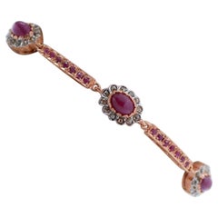 Armband aus Rubinen, Diamanten, Roségold und Silber.