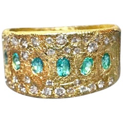 Anello Leto Lama con tormaline brasiliane Paraiba blu neon e diamanti in oro 18 carati