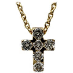 Van Cleef & Arpels, collier pendentif vintage en or jaune 18 carats avec mini croix et diamants