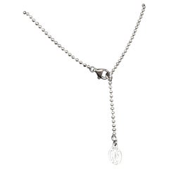 Cartier, collier authentique boule en or blanc 18 carats