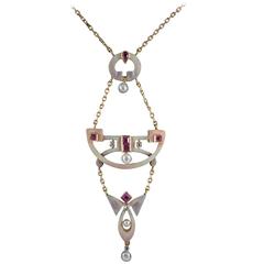 Art Nouveau enamel and Gem set pendant 10
