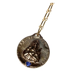 Chaîne collier long Joan of Arc en tanzanite avec médaille