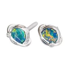 Clous d'oreilles en or blanc 18 carats, opale doublet australienne et diamants
