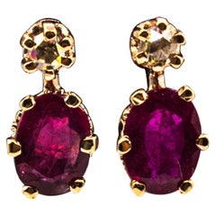 Orecchini a leva in oro giallo con diamante bianco taglio rosa e rubino in stile Art Deco