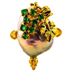 Gelbgold-Cocktailring im Jugendstil mit 0,20 Karat Smaragd und Perle