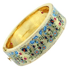 Bracelet jonc lotus en émail, rubis et diamants