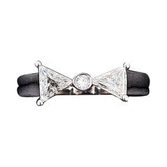 0,64 Anello con diamante Bow Tie