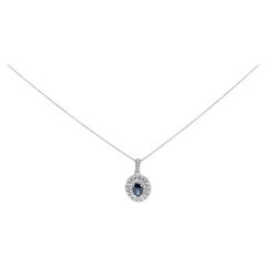 14K White Gold Oval Blue Sapphire and 3/4 Cttw Diamond Fashion Pendant Necklace