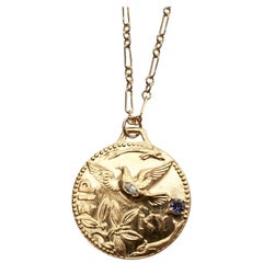 Collier médaillon aigue-marine tanzanite oiseau colombe