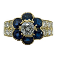 Raro anello d'epoca Van Cleef & Arpels con zaffiro blu e diamanti a fiore Fleurette
