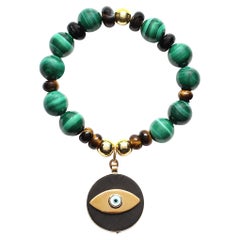 ClariSSA BRONFMAN Bracelet perlé œil de tigre ou d'ébène, malachite et or