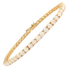 Bracciale tennis in oro giallo massiccio 14k con opale da 4,1 carati