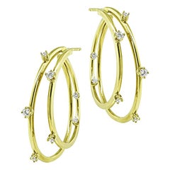 Orecchini in oro con diamanti da 0,40 carati di Tiffany & Co.