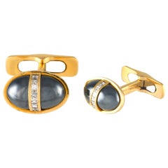 Bvlgari Boutons de manchette en or jaune 18 carats, diamant 0,30 carat et hématite BV10-100224