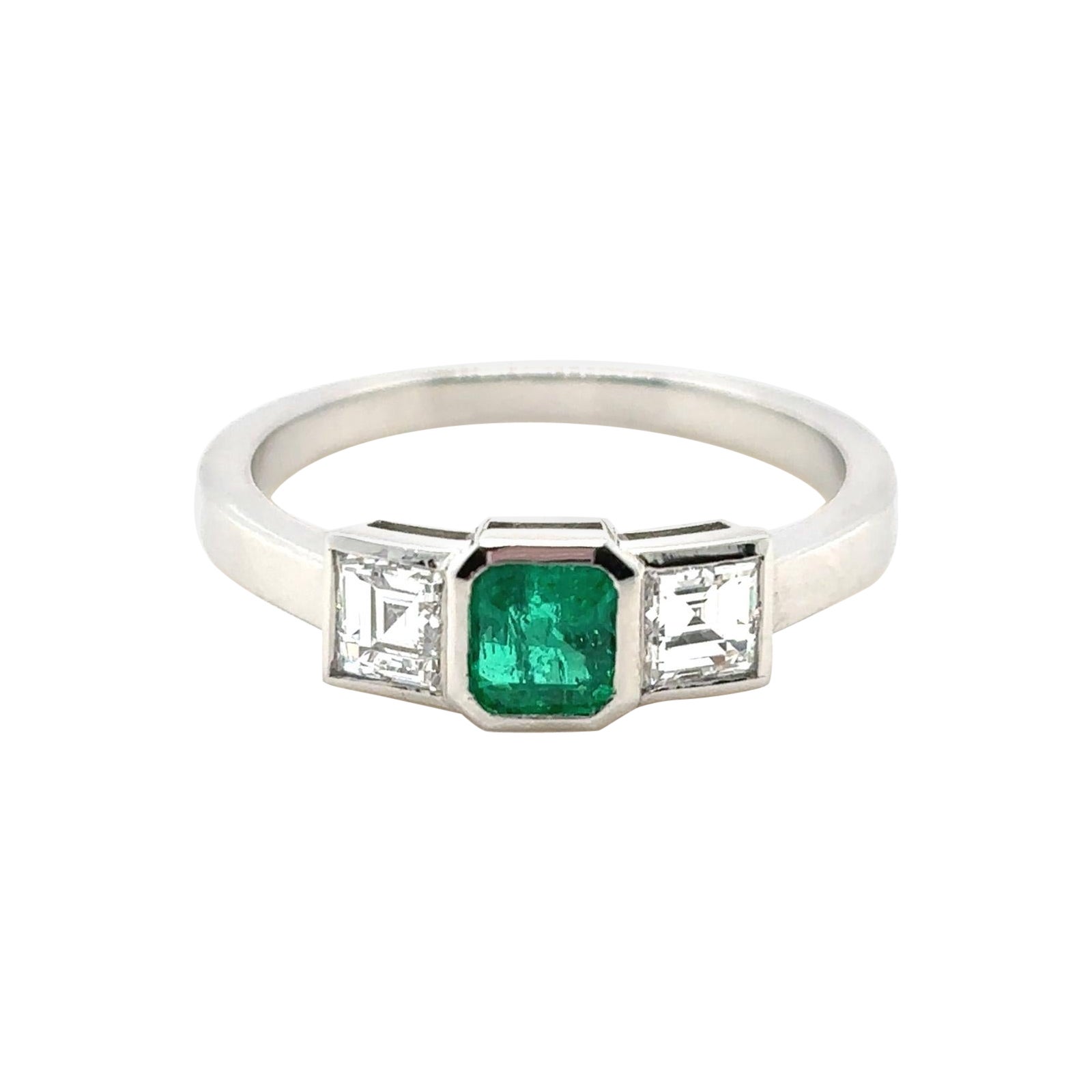 0.40 Carat Emerald and Diamond Three Stone Platinum Engagement Ring