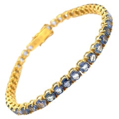 Bracciale tennis in oro con zaffiro blu naturale CTW 11