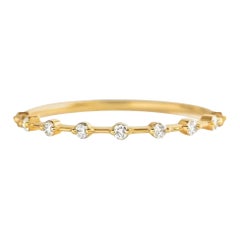 Half eternity moissanite 14k gold ring.