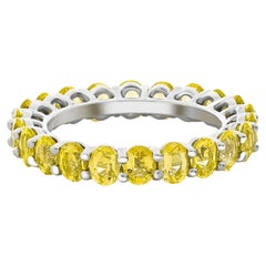 Oval Lab Sapphire Full Eternity Wedding Band.