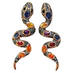 Pendientes Bochic "Oriente" de rubí y zafiro múltiple en forma de serpiente, engastados en oro de 18 quilates y plata