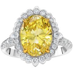 GIA Certified Fancy Intense Yellow Diamond Halo Engagement Ring 4