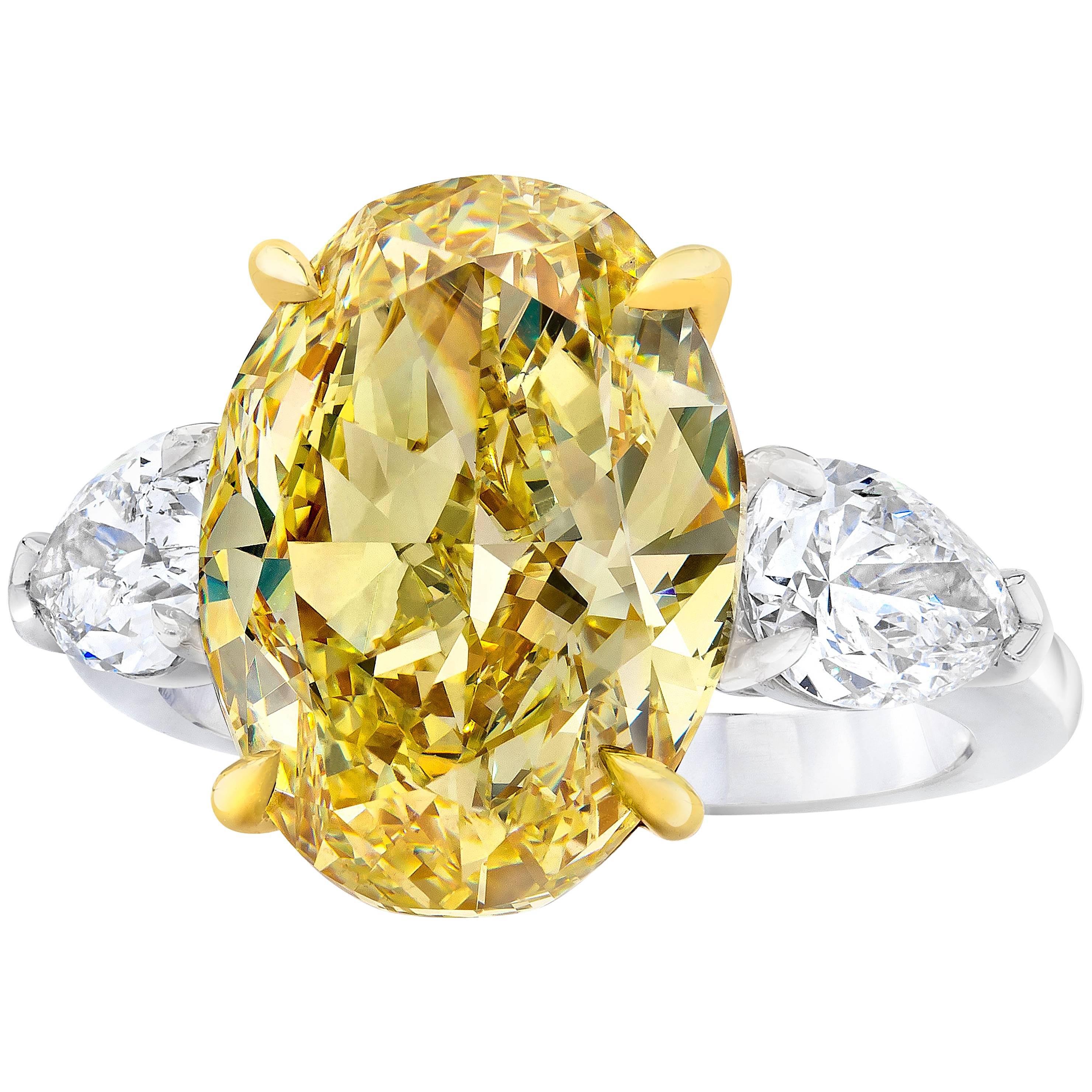 GIA Certified 8.88 Carat Fancy Yellow Diamond Three-Stone Engagement Ring