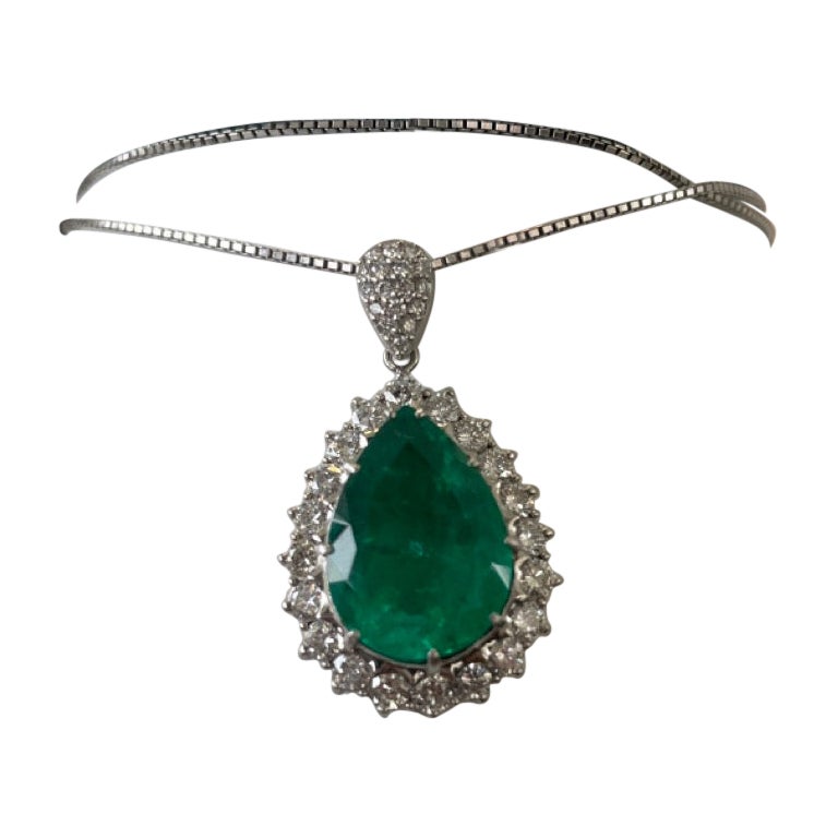 9.55 Pear Shape Emerald Pendant Diamond Bordered For Sale