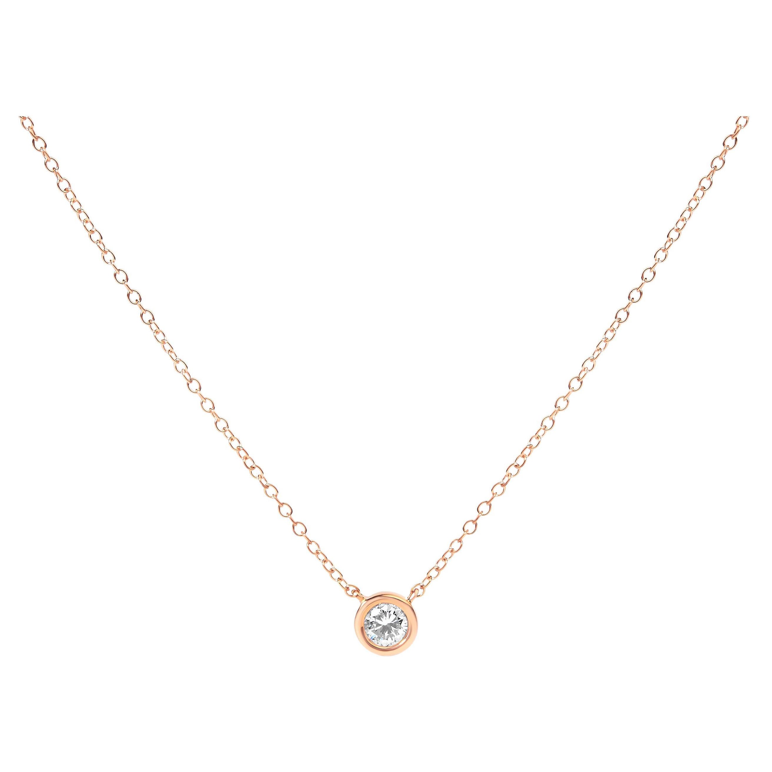 Collier pendentif solitaire moderne serti clos en or rose 10 carats et diamants 1/5 carat