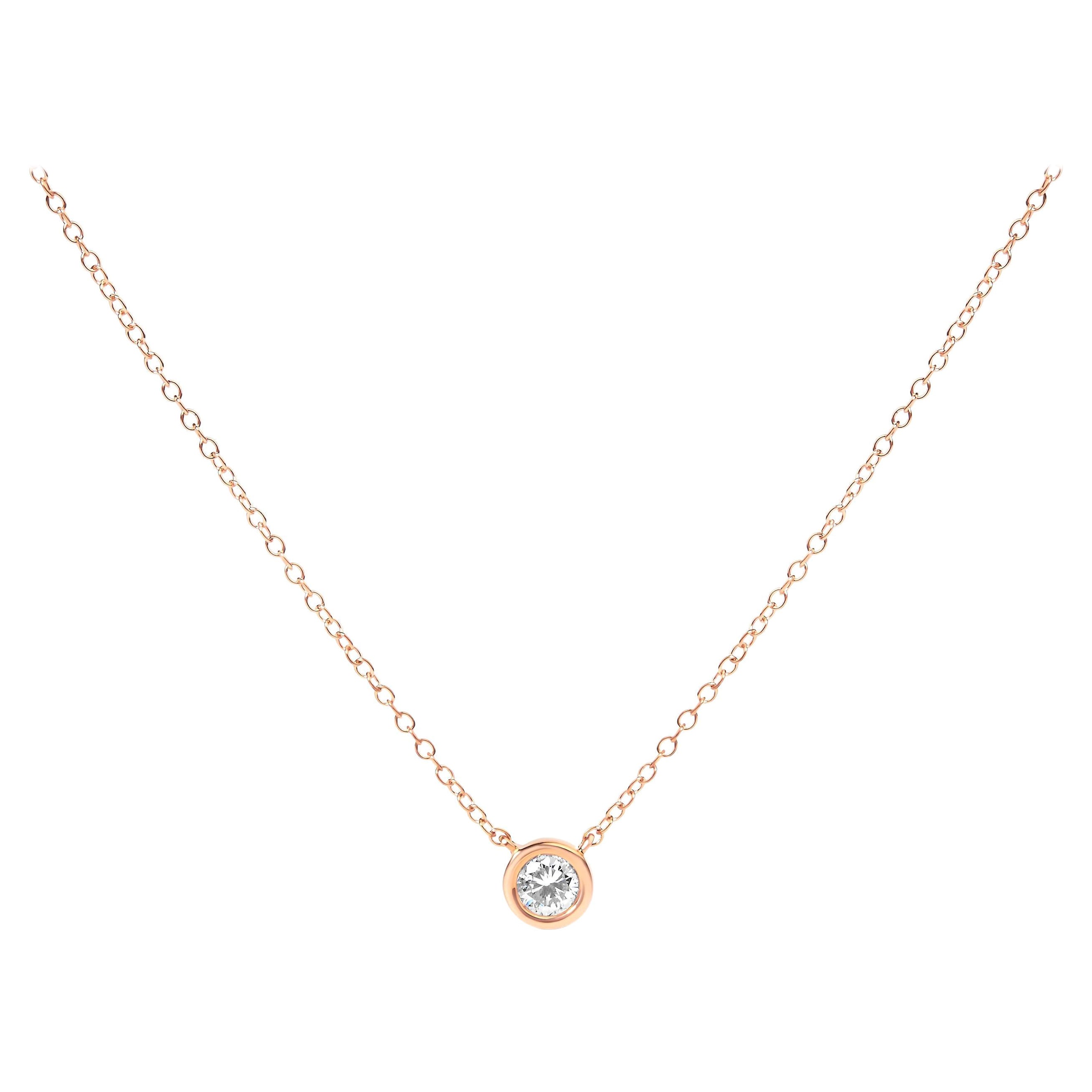 Collier pendentif solitaire moderne serti clos en or rose 10 carats et diamants de 1/3 carat