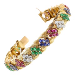 Bracciale con rubini, smeraldi, zaffiri e diamanti Mauboussin Paris